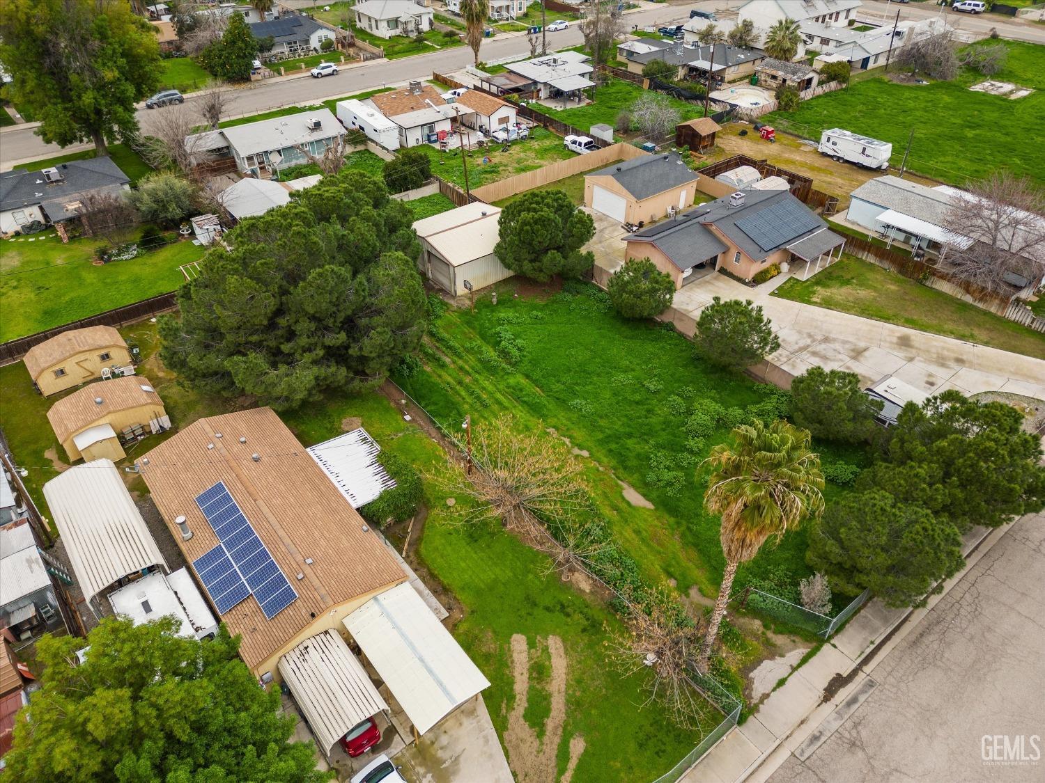 Undisclosed Address Bakersfield, CA 93308 - Photo 33 of 50 an aerial view of residential houses with outdoor space