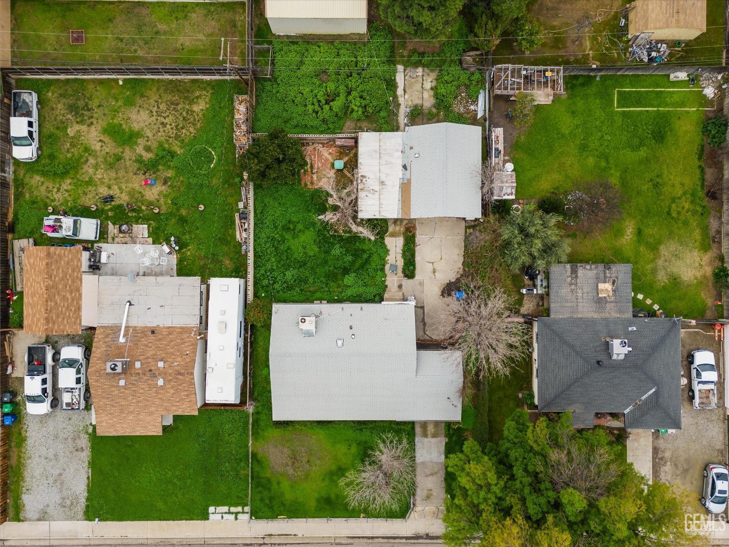 Undisclosed Address Bakersfield, CA 93308 - Photo 36 of 50 an aerial view of a house with outdoor space patio and lake view