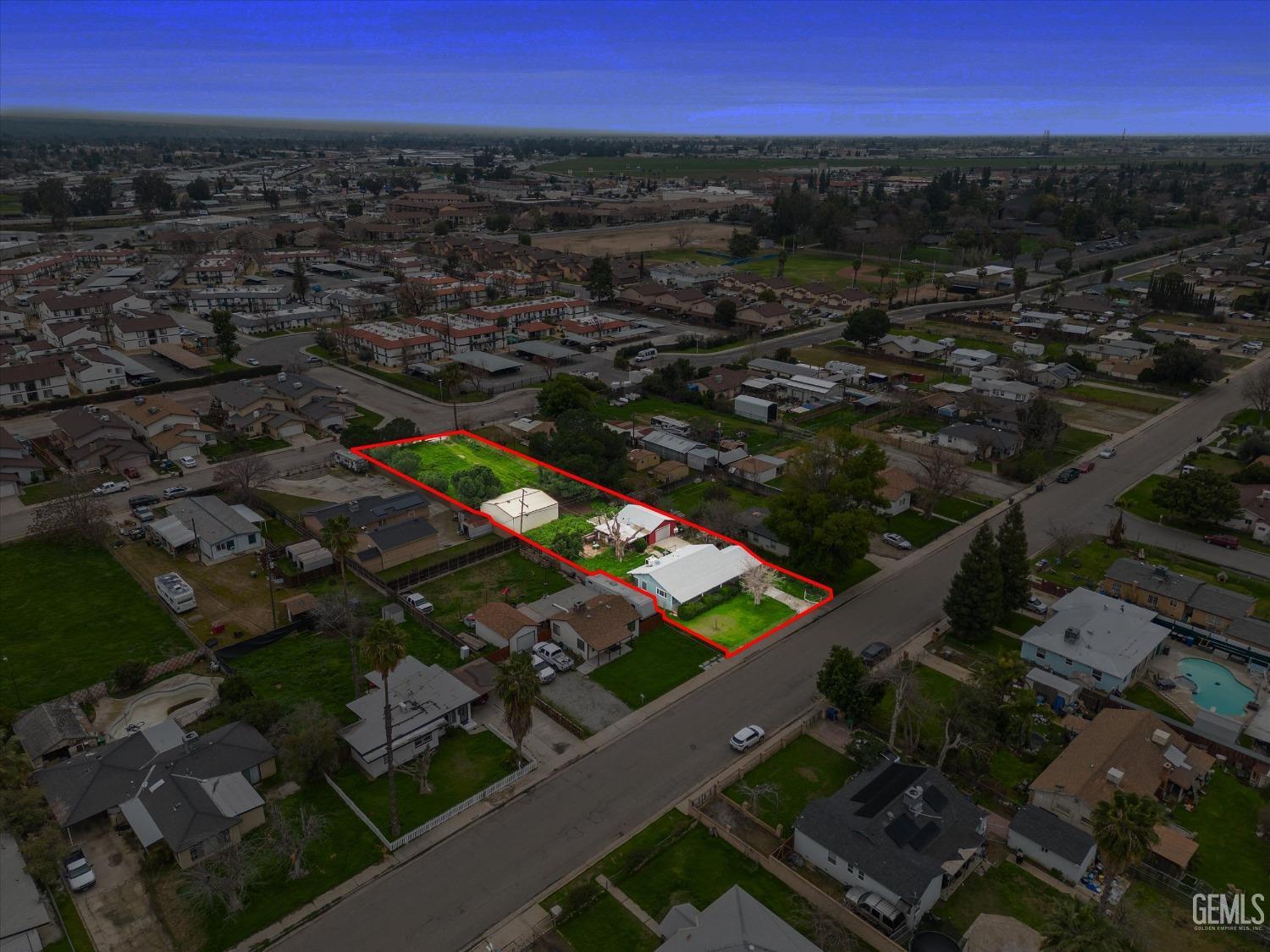 Undisclosed Address Bakersfield, CA 93308 - Photo 50 of 50 an aerial view of residential houses with city view