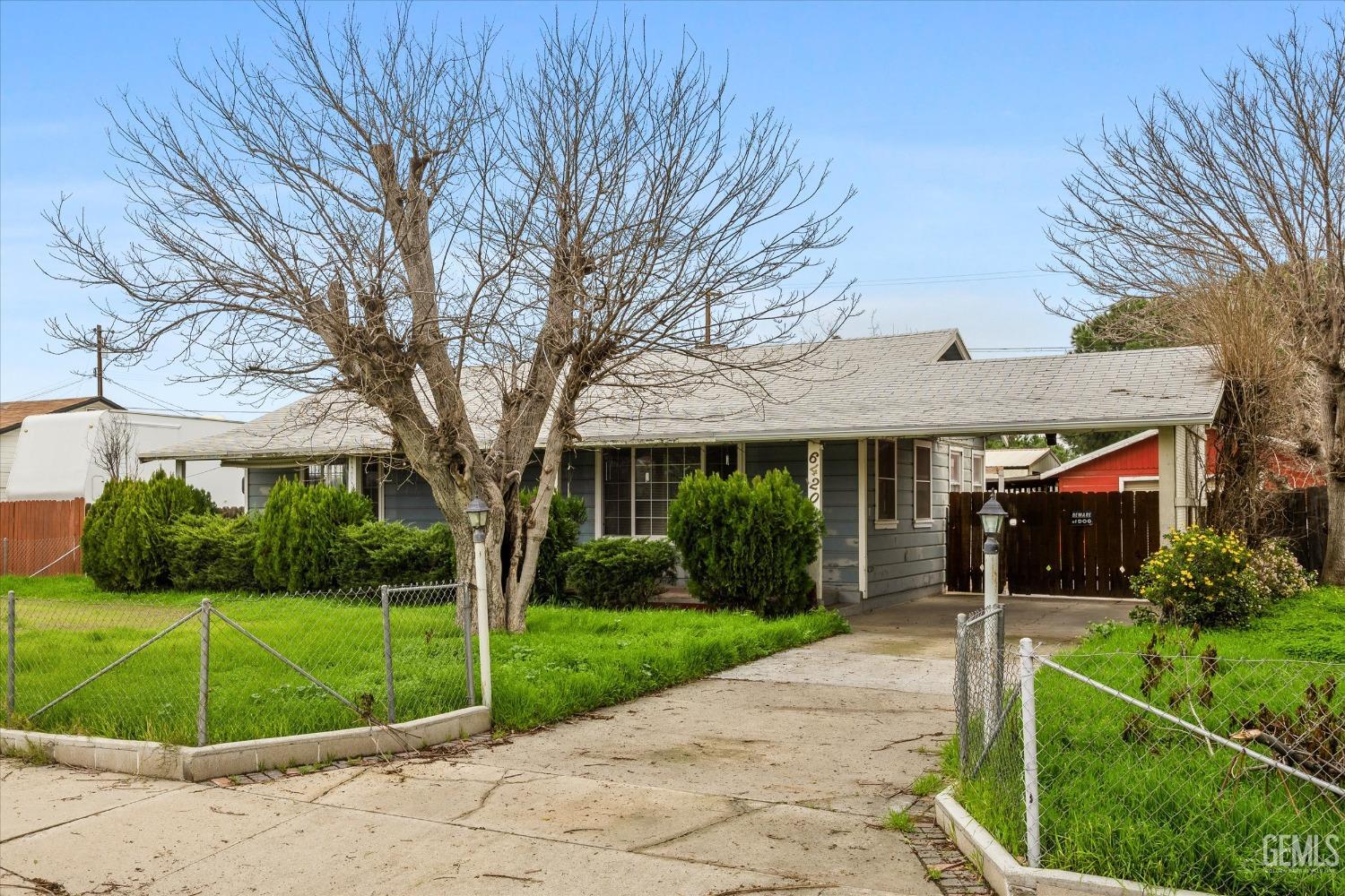 Undisclosed Address Bakersfield, CA 93308 - Photo 5 of 50 a view of house with a garden