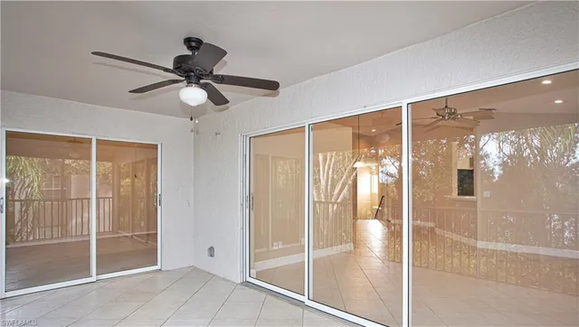 a view of a house with a tree