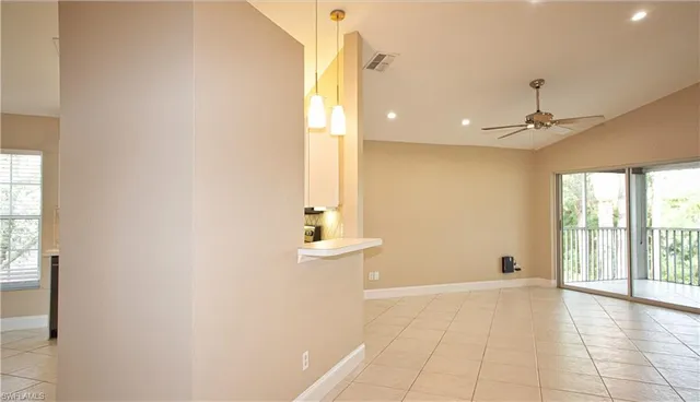 a view of an empty room and window