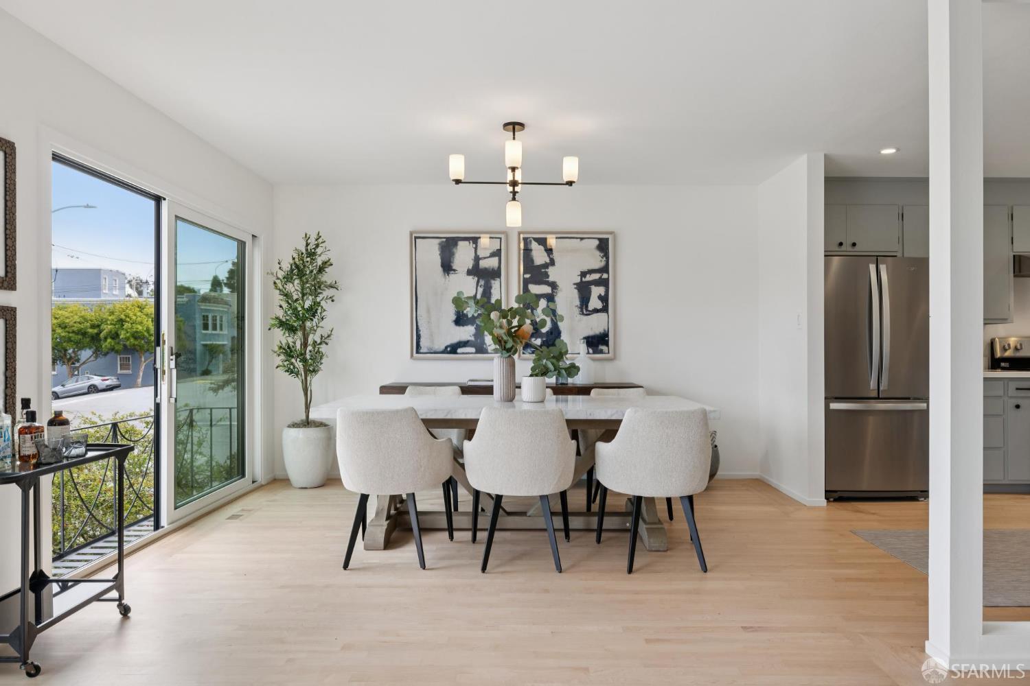 1983 10th Avenue San Francisco, CA 94116 - Photo 11 of 32 a view of a dining room with furniture window and outside view