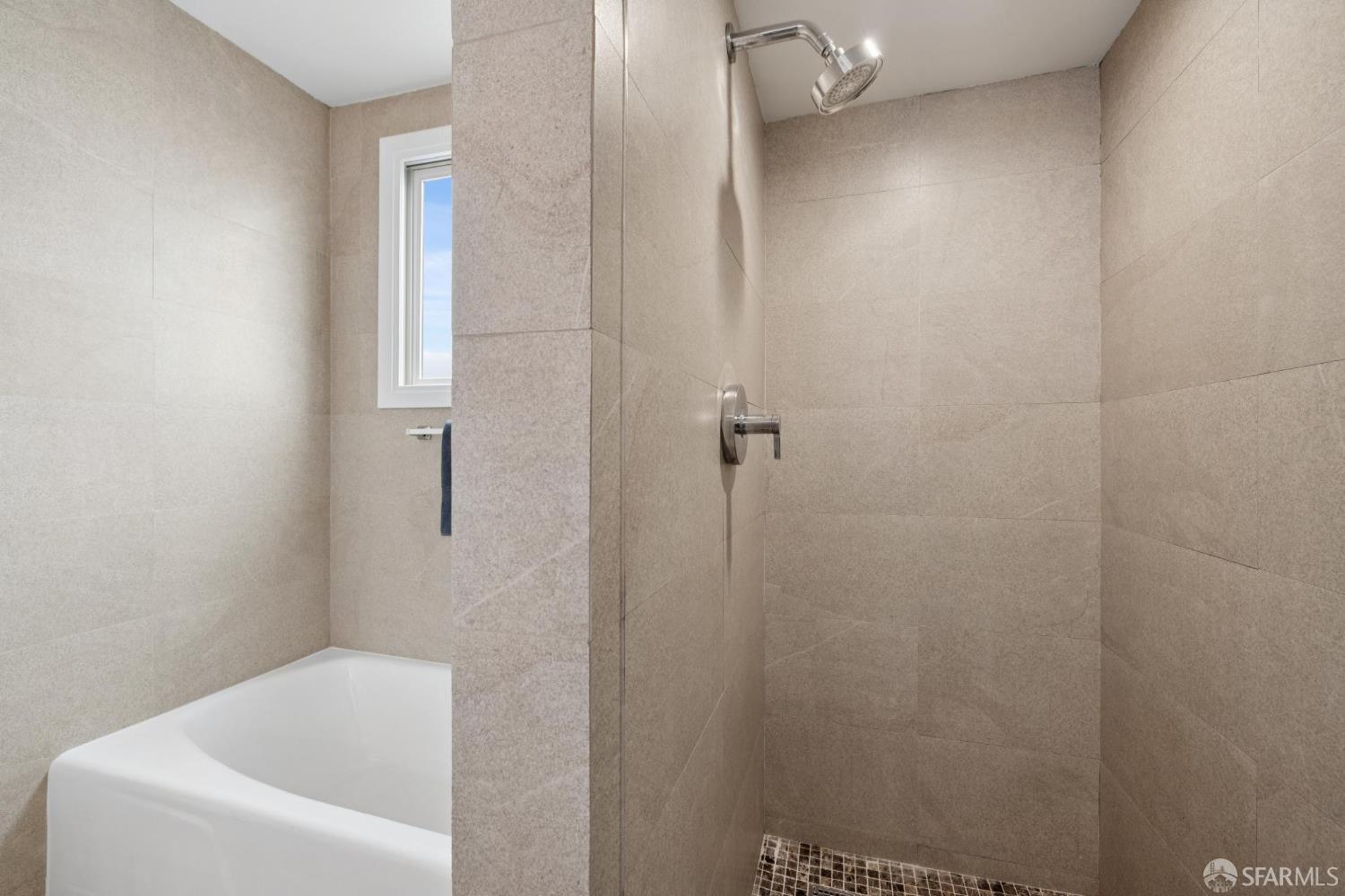 1983 10th Avenue San Francisco, CA 94116 - Photo 25 of 32 a bathroom with a white bath tub