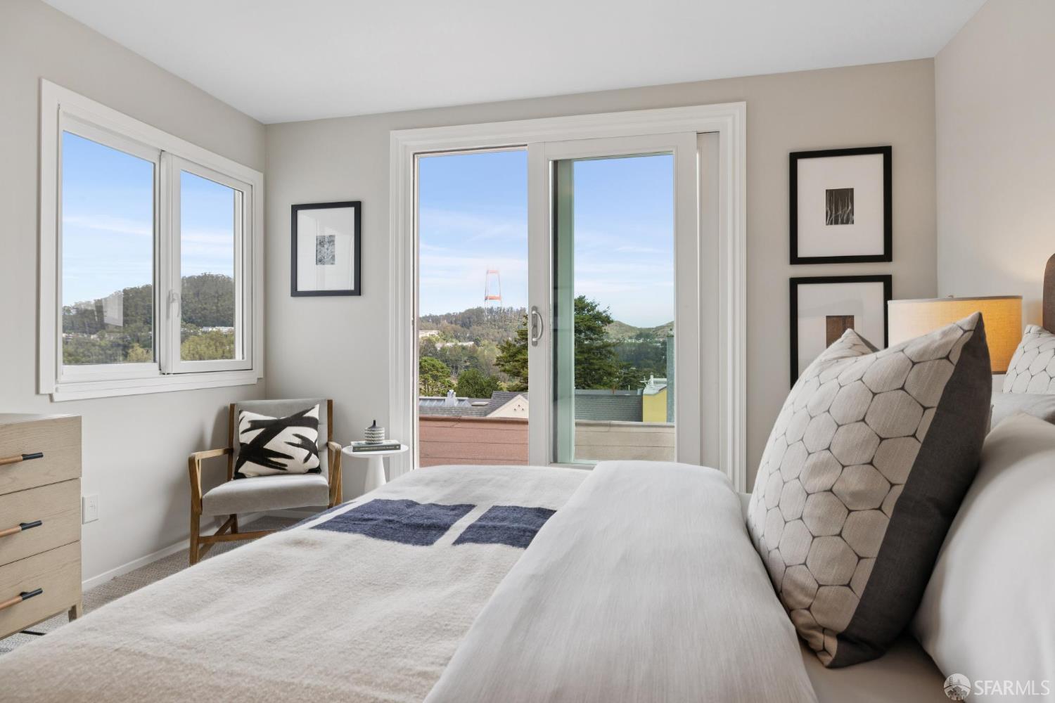 1983 10th Avenue San Francisco, CA 94116 - Photo 27 of 32 a bedroom with a bed and wooden floor