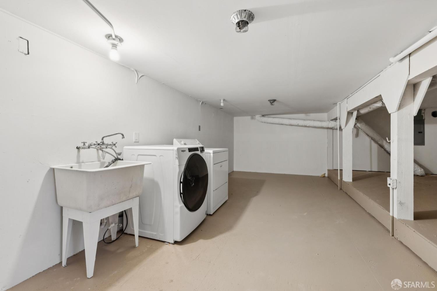 1983 10th Avenue San Francisco, CA 94116 - Photo 28 of 32 a utility room with dryer and washer