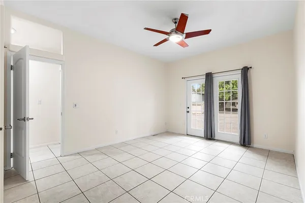 a house view with a sitting space and garden