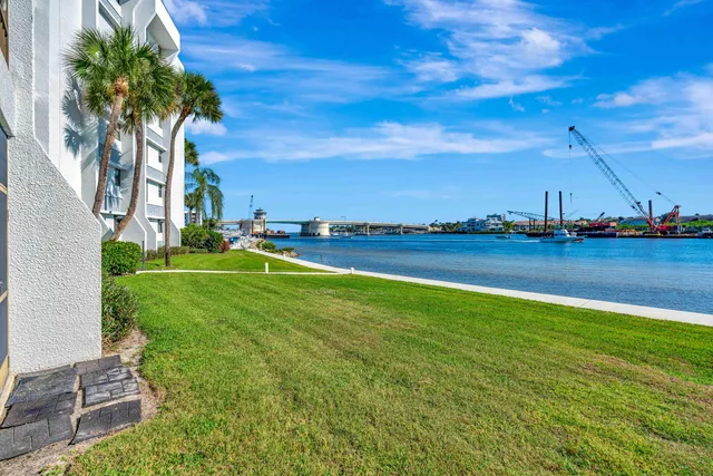 a view of a building with a yard