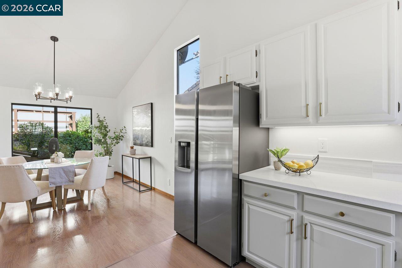 221 Tangerine Court San Ramon, CA 94583 - Photo 12 of 27 a kitchen with stainless steel appliances granite countertop a refrigerator and a stove