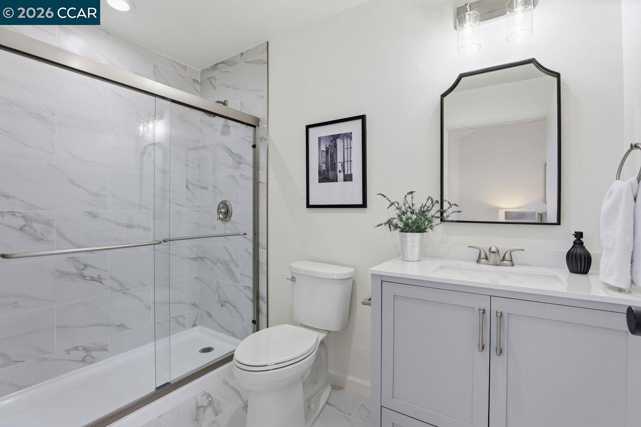 221 Tangerine Court San Ramon, CA 94583 - Photo 19 of 27 a bathroom with a sink toilet and shower