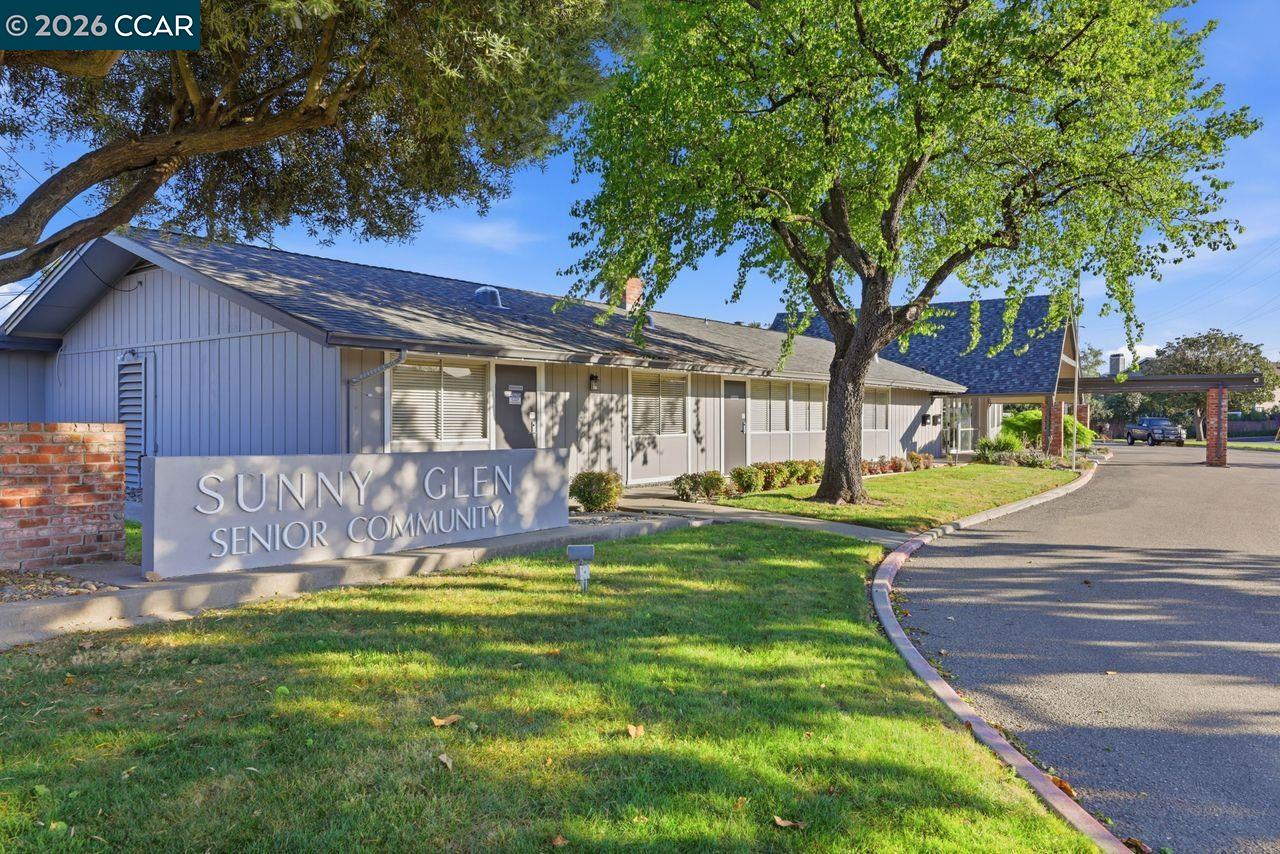 221 Tangerine Court San Ramon, CA 94583 - Photo 26 of 27 a view of a backyard with table and chairs and a fire pit