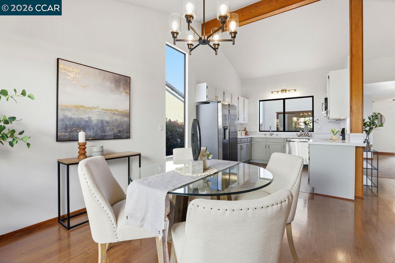 221 Tangerine Court San Ramon, CA 94583 - Photo 10 of 27 a view of a dining room with furniture wooden floor and a chandelier
