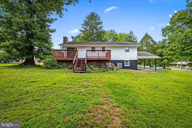 a view of a house with a big yard