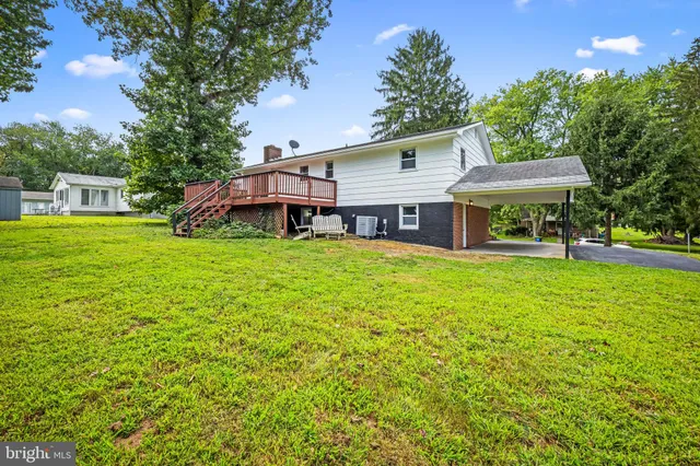 a view of a house with a big yard