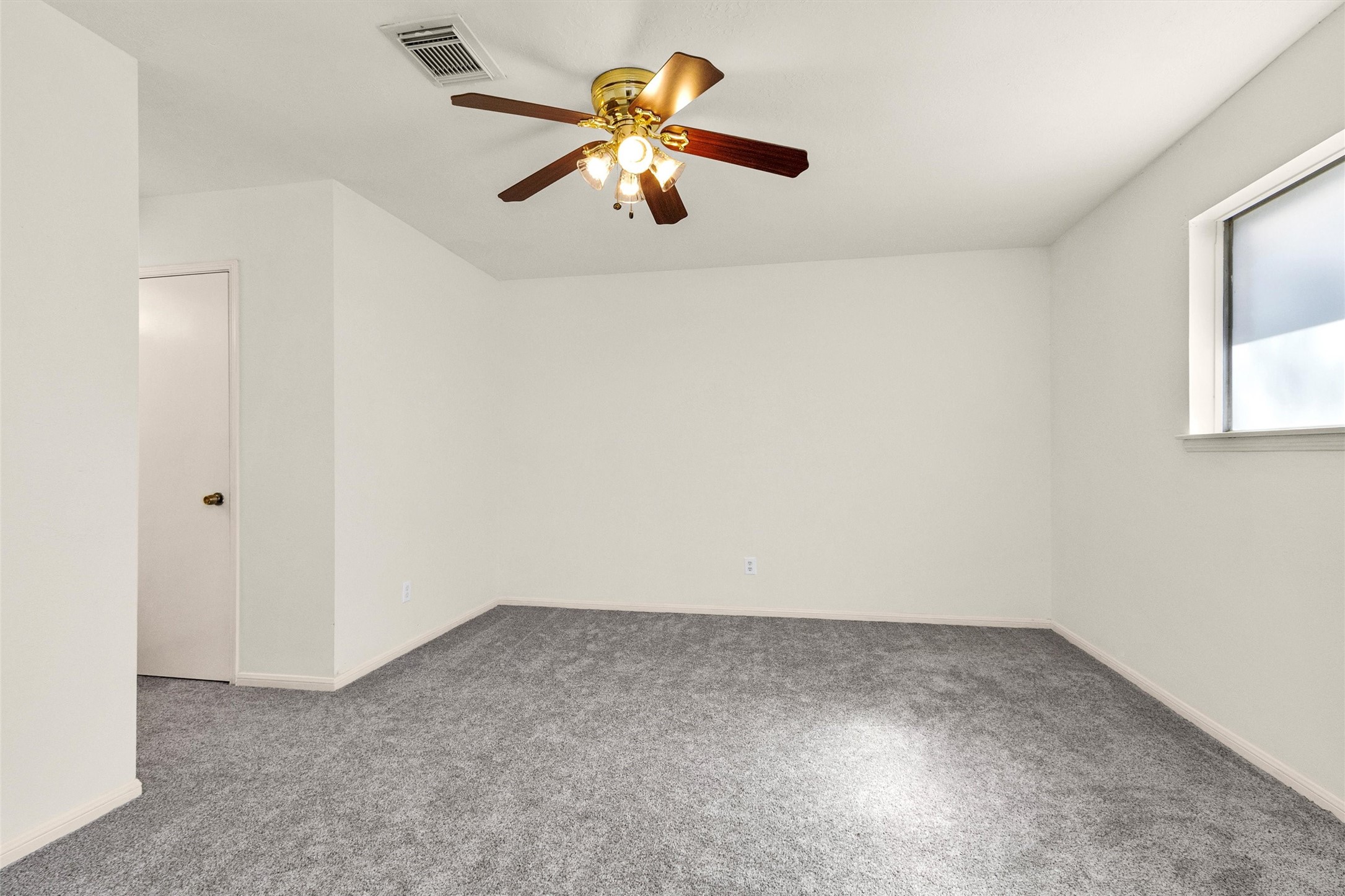 23014 Berry Pine Drive Spring, TX 77373 - Photo 16 of 29 View as your walking in the priamry bedroom with window looking out to the backyard.