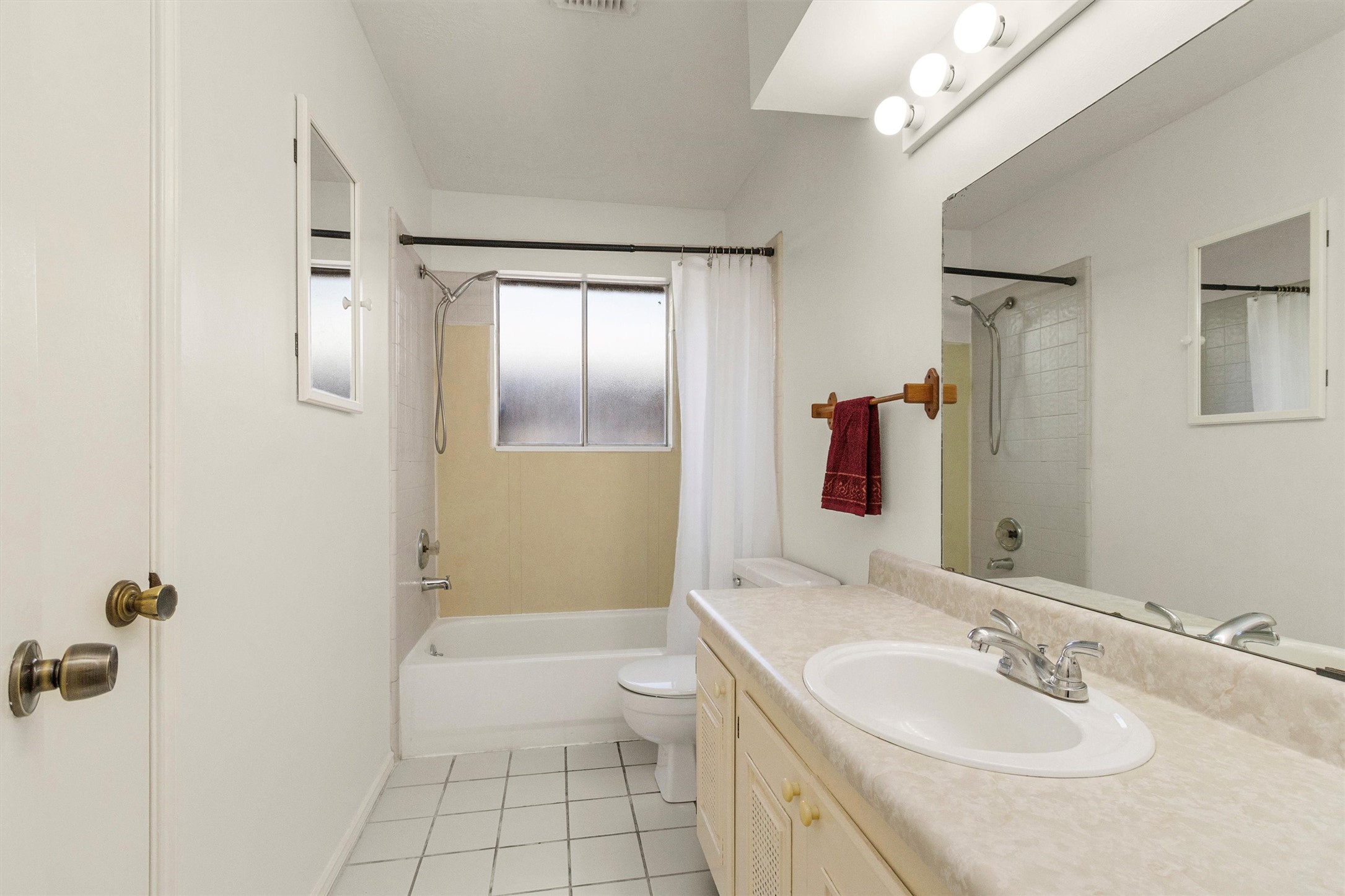 23014 Berry Pine Drive Spring, TX 77373 - Photo 21 of 29 Hall bath that services the secondary bedrooms offers long counter space and tub/shower combo.