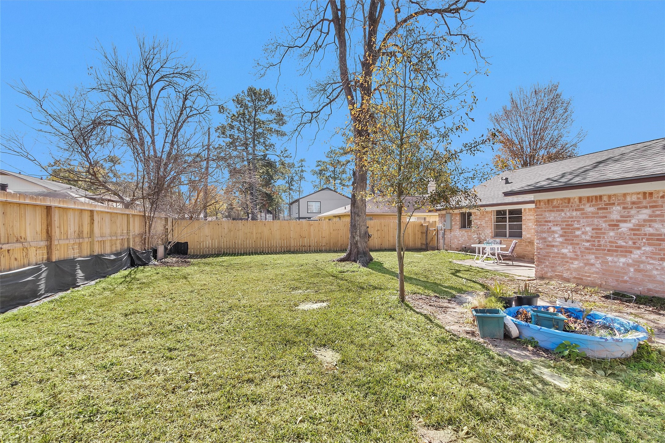 23014 Berry Pine Drive Spring, TX 77373 - Photo 27 of 29 NEW FENCE, large backyard for the the kiddos and critters.