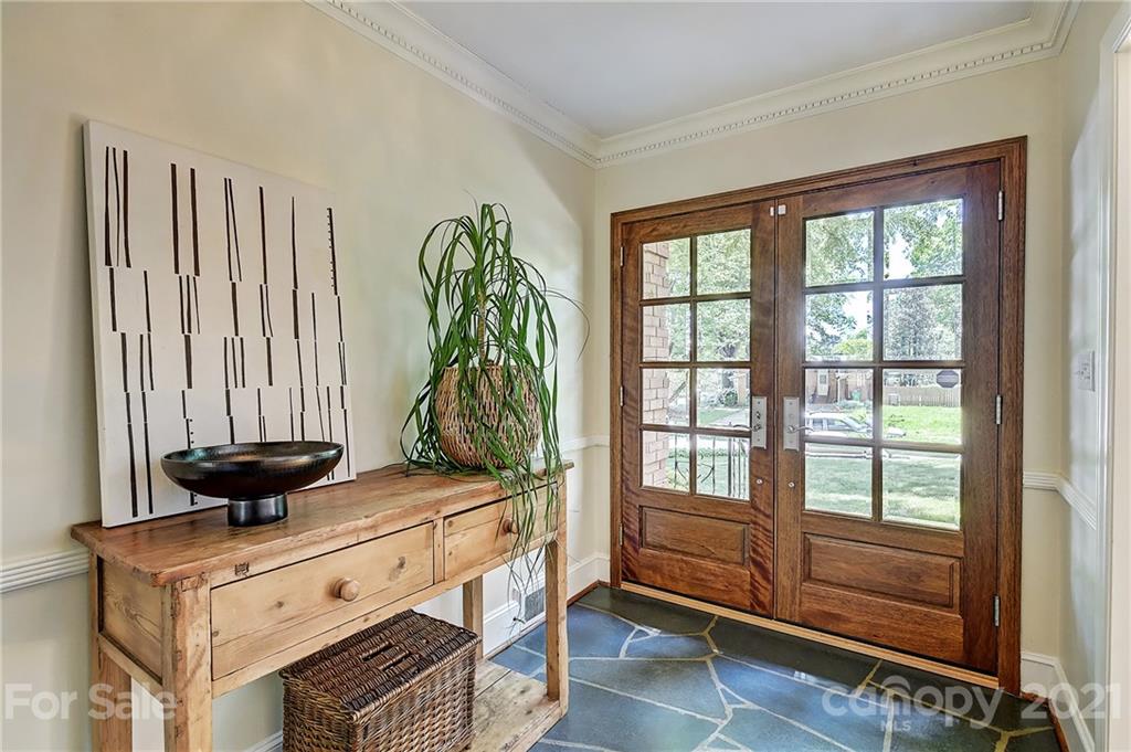 6119 Glenridge Road Charlotte, NC 28211 - Photo 3 of 41 a view of a room that has a bed and a window