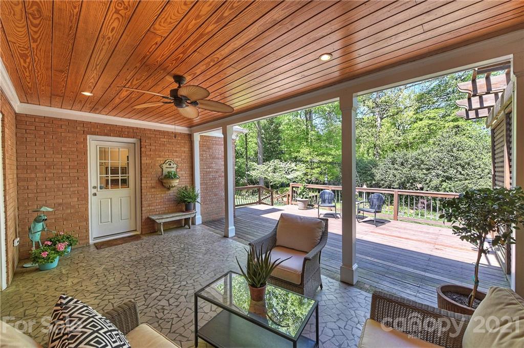 6119 Glenridge Road Charlotte, NC 28211 - Photo 30 of 41 a living room with furniture and a yard