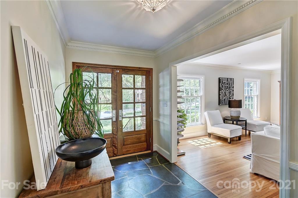 6119 Glenridge Road Charlotte, NC 28211 - Photo 4 of 41 a living room with furniture and a large window