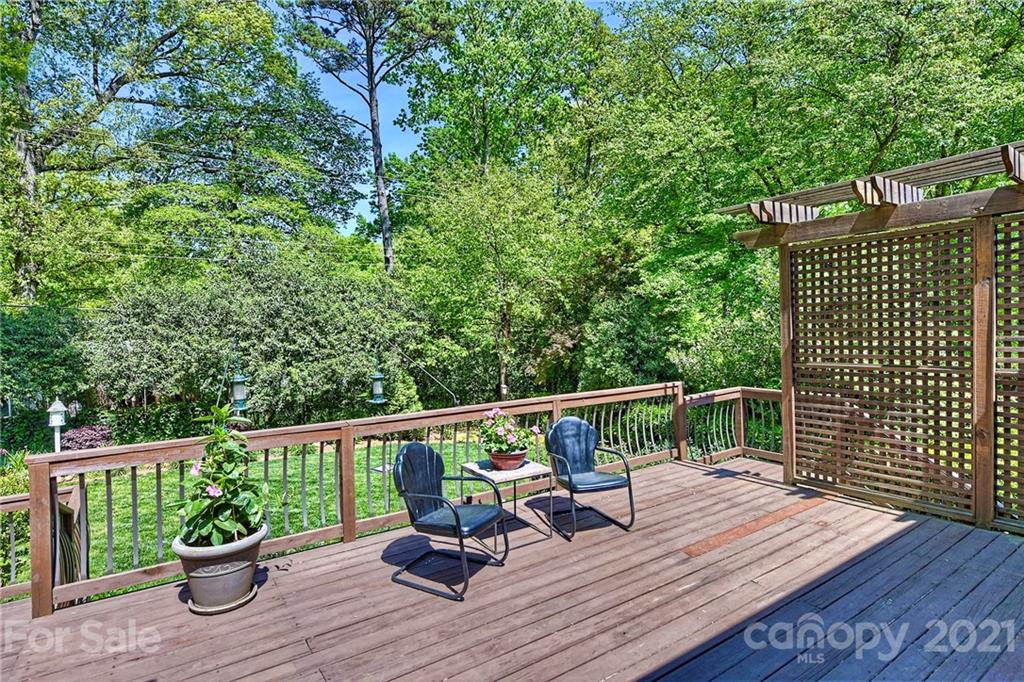 6119 Glenridge Road Charlotte, NC 28211 - Photo 32 of 41 a view of roof deck with seating space