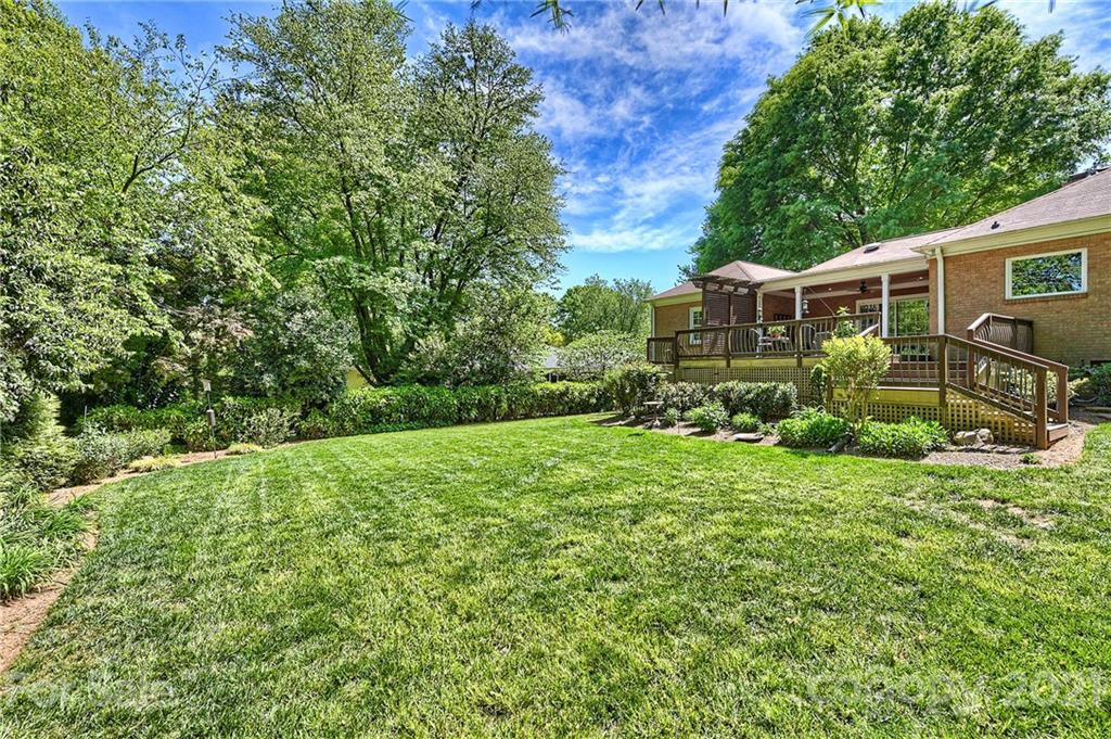 6119 Glenridge Road Charlotte, NC 28211 - Photo 33 of 41 a view of backyard of house with green space