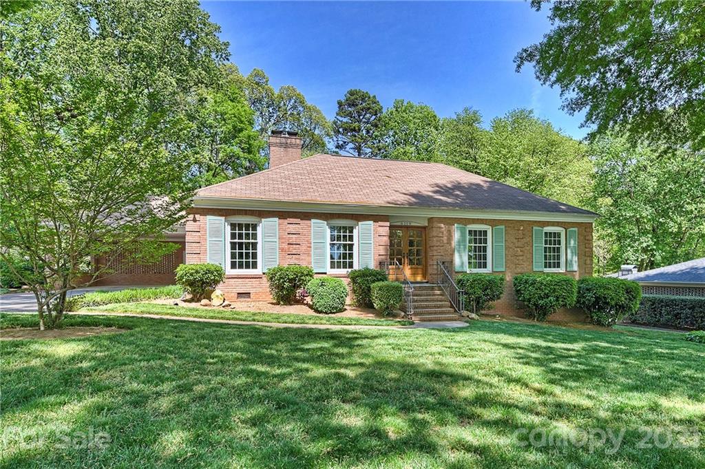 6119 Glenridge Road Charlotte, NC 28211 - Photo 41 of 41 a backyard of a house with seating space