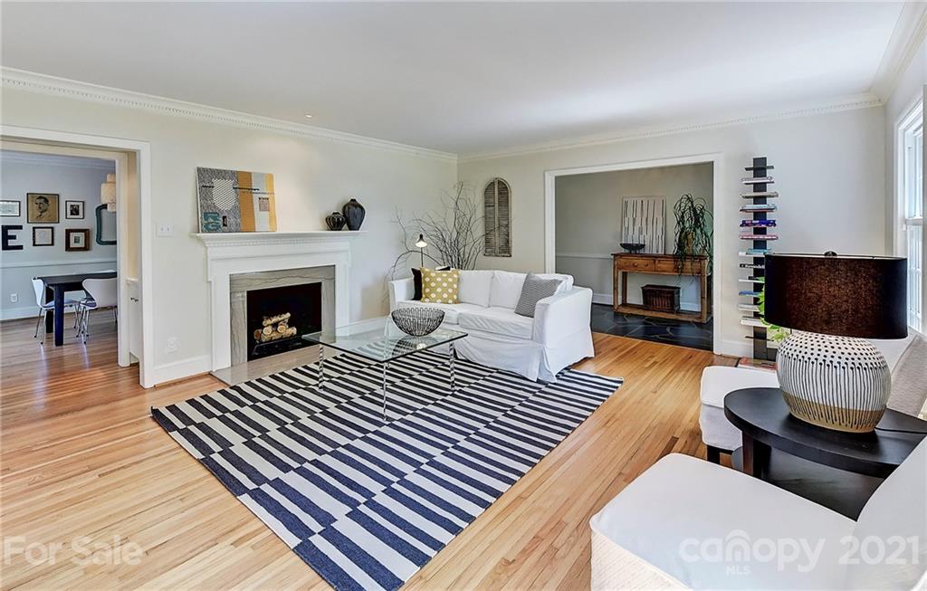 6119 Glenridge Road Charlotte, NC 28211 - Photo 7 of 41 a living room with furniture and a fireplace