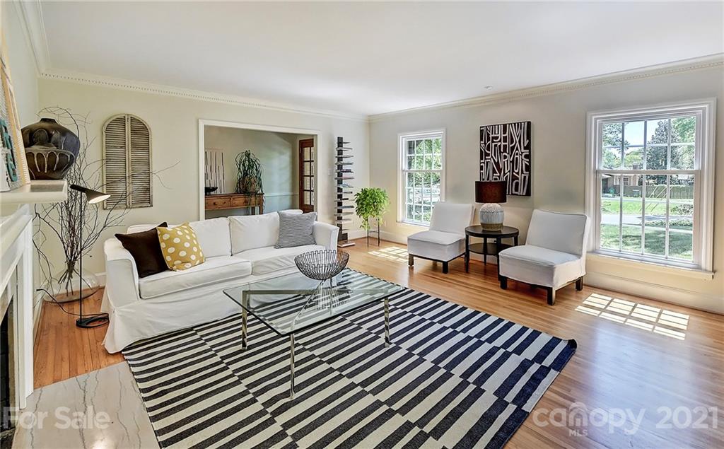 6119 Glenridge Road Charlotte, NC 28211 - Photo 8 of 41 a living room with furniture and a large window