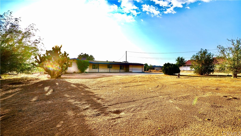 16826 Walpi Road Apple Valley, CA 92307 - Photo 1 of 1 a view of swimming pool with an outdoor space