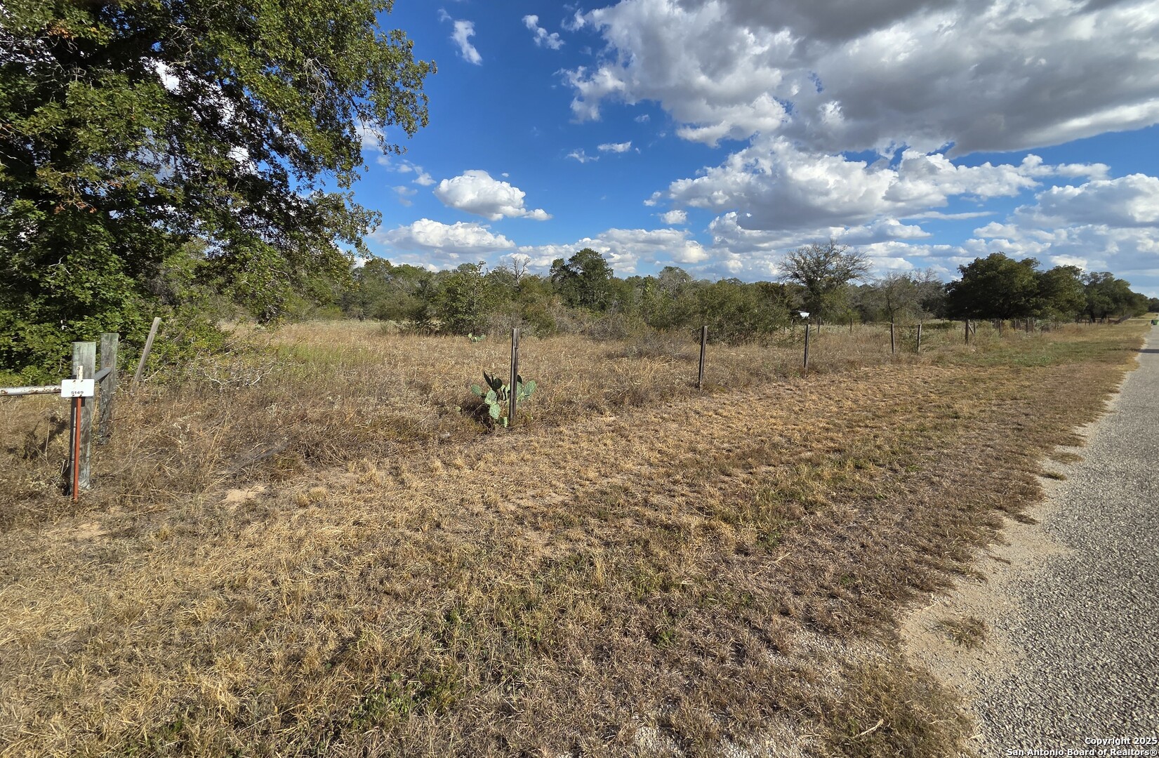 1830 Clear Lake Loop Poteet, TX 78065 - Photo 1 of 30 a view of a lake with houses