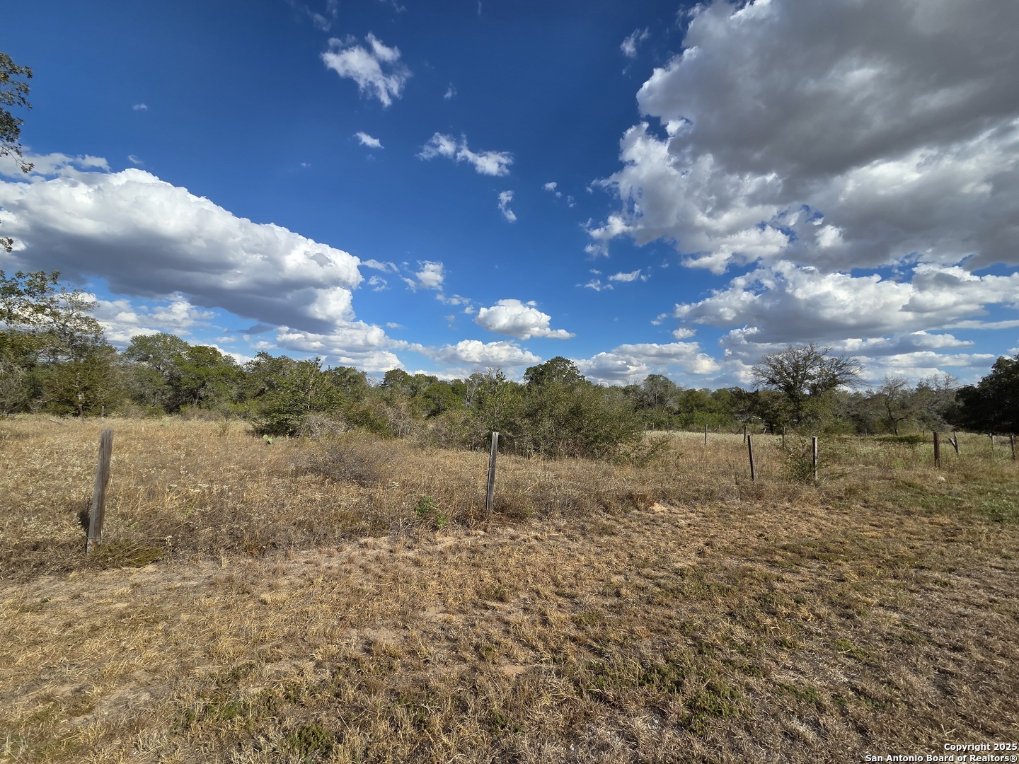 1830 Clear Lake Loop Poteet, TX 78065 - Photo 17 of 30 a view of mountain with sunset