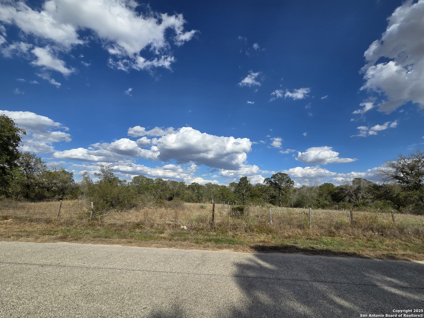 1830 Clear Lake Loop Poteet, TX 78065 - Photo 19 of 30 a view of a road with an ocean view