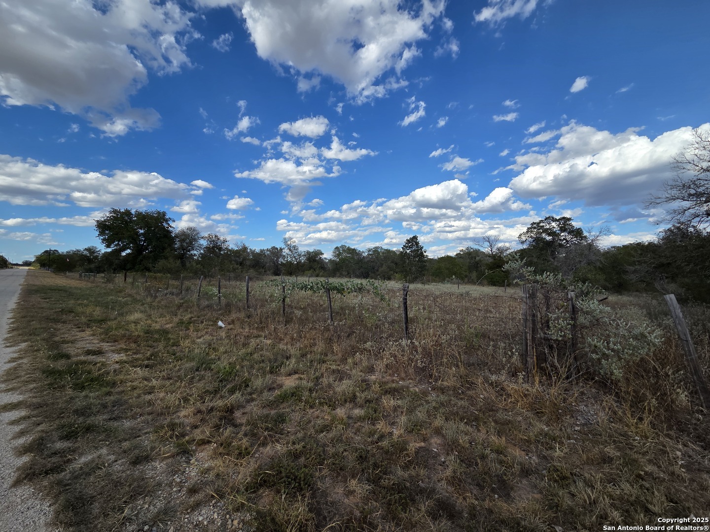 1830 Clear Lake Loop Poteet, TX 78065 - Photo 21 of 30 a view of a lake with green space