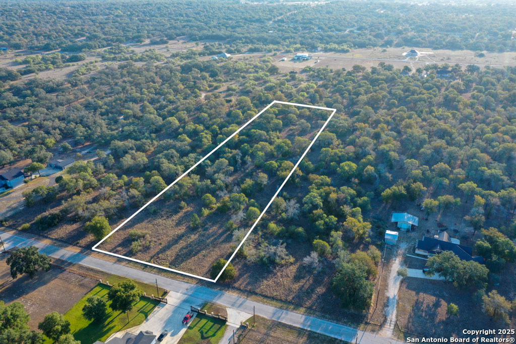 1830 Clear Lake Loop Poteet, TX 78065 - Photo 27 of 30 a view of a tennis court