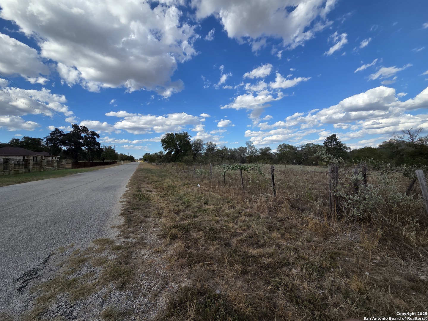 1830 Clear Lake Loop Poteet, TX 78065 - Photo 9 of 30 a view of a yard with an outdoor space