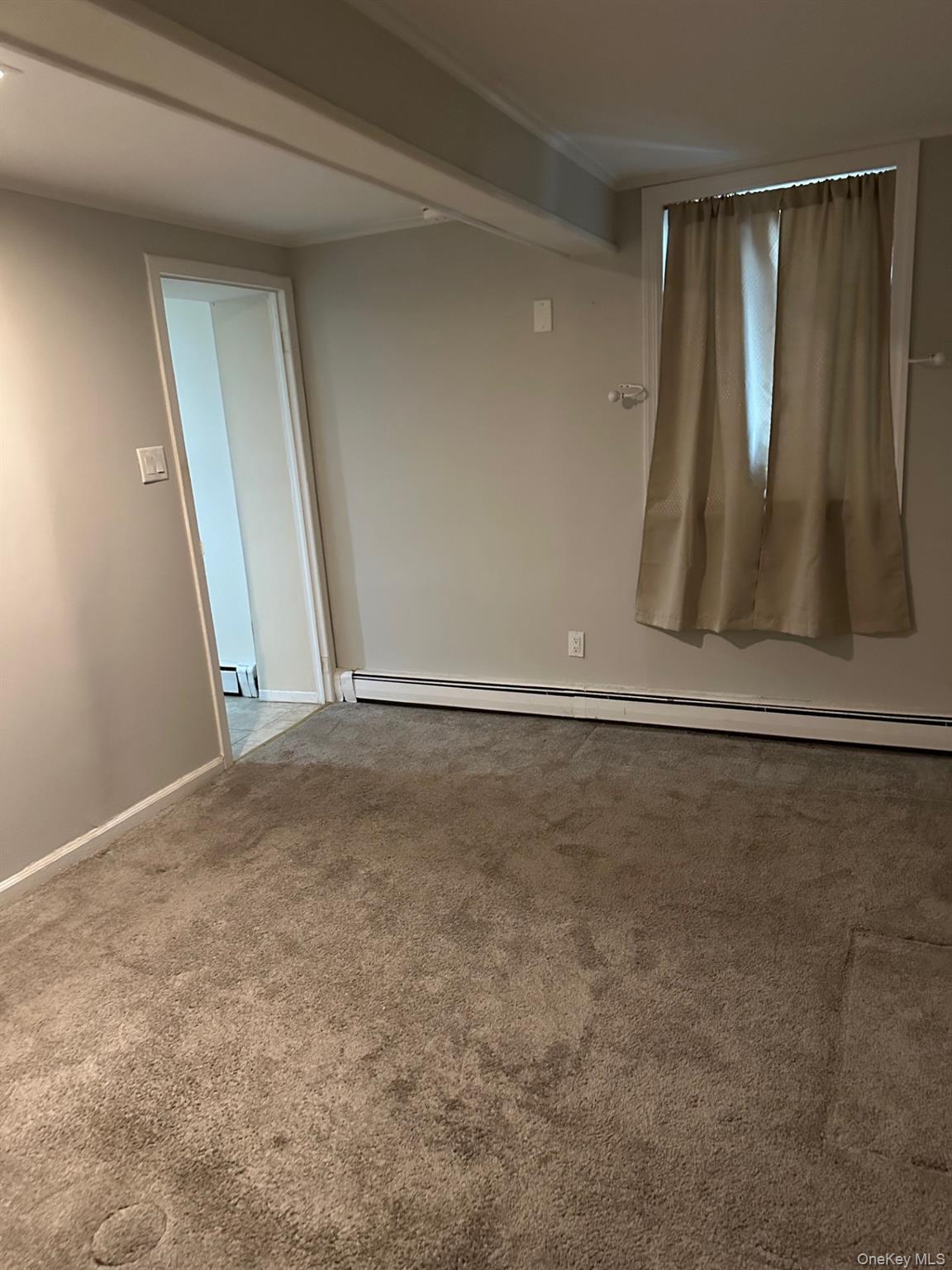 7 Yucca Road, Unit LOWR Rocky Point, NY 11778 - Photo 9 of 11 a view of an empty room