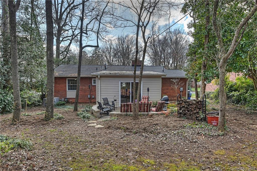 725 Lochridge Road Charlotte, NC 28209 - Photo 24 of 25 a front view of a house with garden