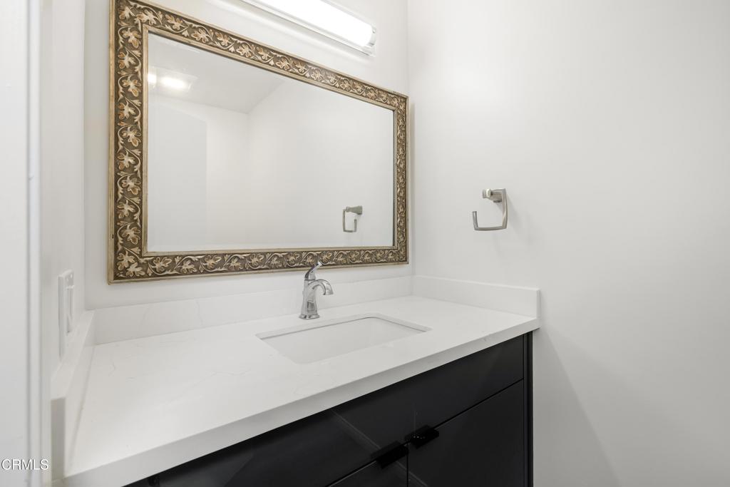 2915 Hopeton Road La Crescenta, CA 91214 - Photo 36 of 41 a bathroom with a sink and a mirror