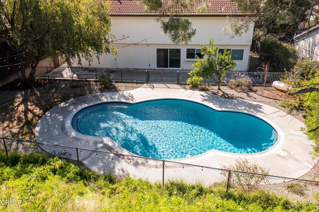 2915 Hopeton Road La Crescenta, CA 91214 - Photo 5 of 41 a swimming pool with outdoor seating and plants