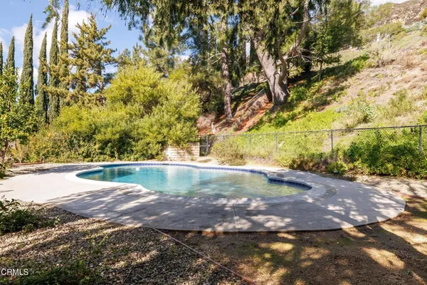 a view of a back yard of the house