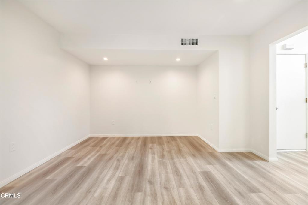 2915 Hopeton Road La Crescenta, CA 91214 - Photo 10 of 41 a view of a room with wooden floor and white walls