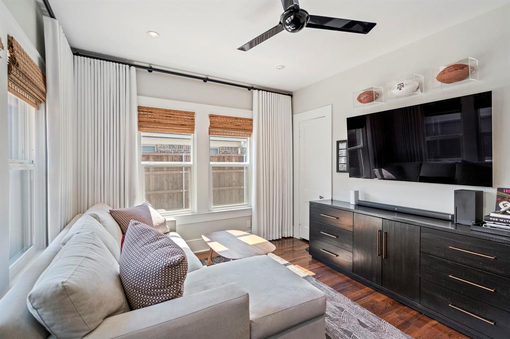 5822 Monticello Avenue Dallas, TX 75206 - Photo 21 of 24 a living room with furniture and a flat screen tv
