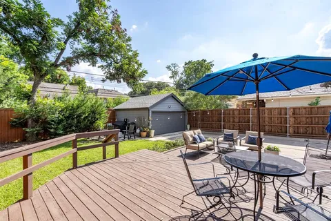 a view of a chairs and table in the wooden floor