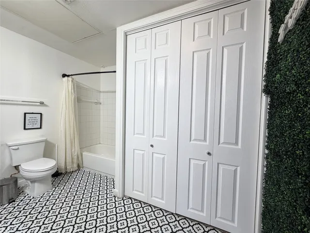 a bathroom with a toilet