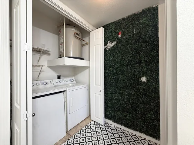 a bathroom with a shower and a sink
