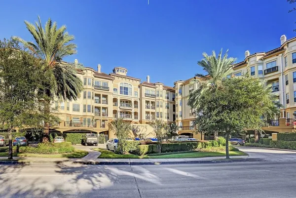 a view of a building with a street