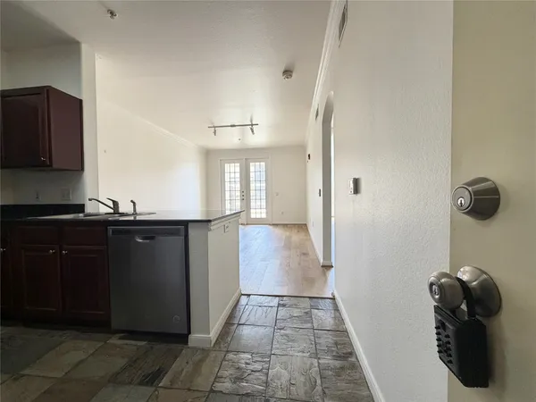 a bathroom with a sink and mirror