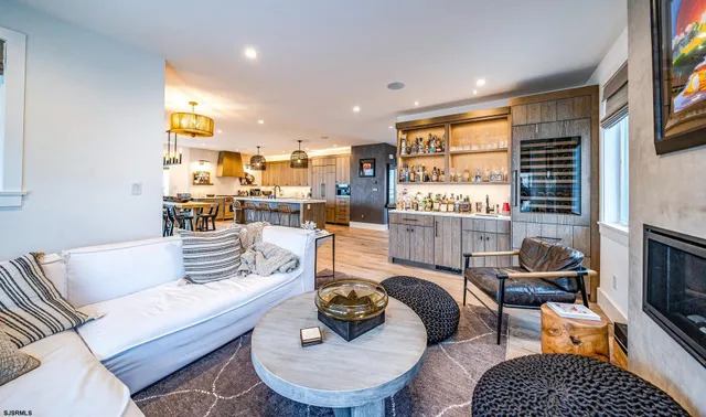 a living room with furniture and a table