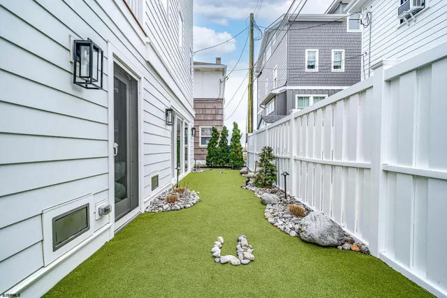 a kitchen with stainless steel appliances granite countertop a stove and cabinets